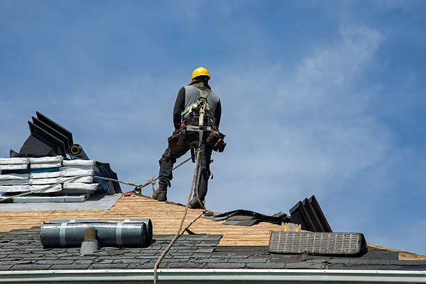 Professional Gutter Installation technician working in Westhampton Beach, NY